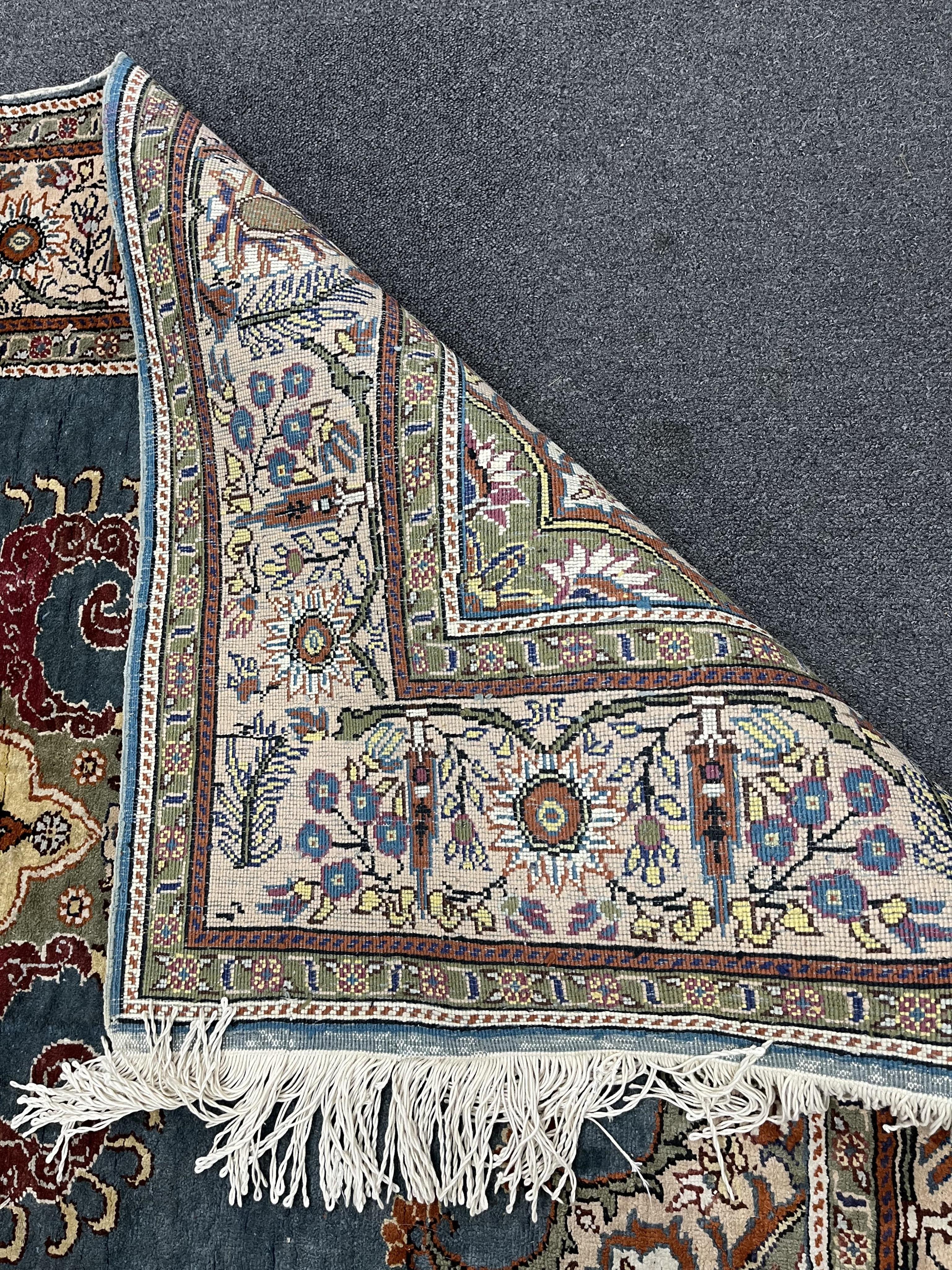 A North West Persian blue ground rug, 190 x 120cm